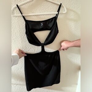 Sexy bodycon mini dress with open detailing on waist/back